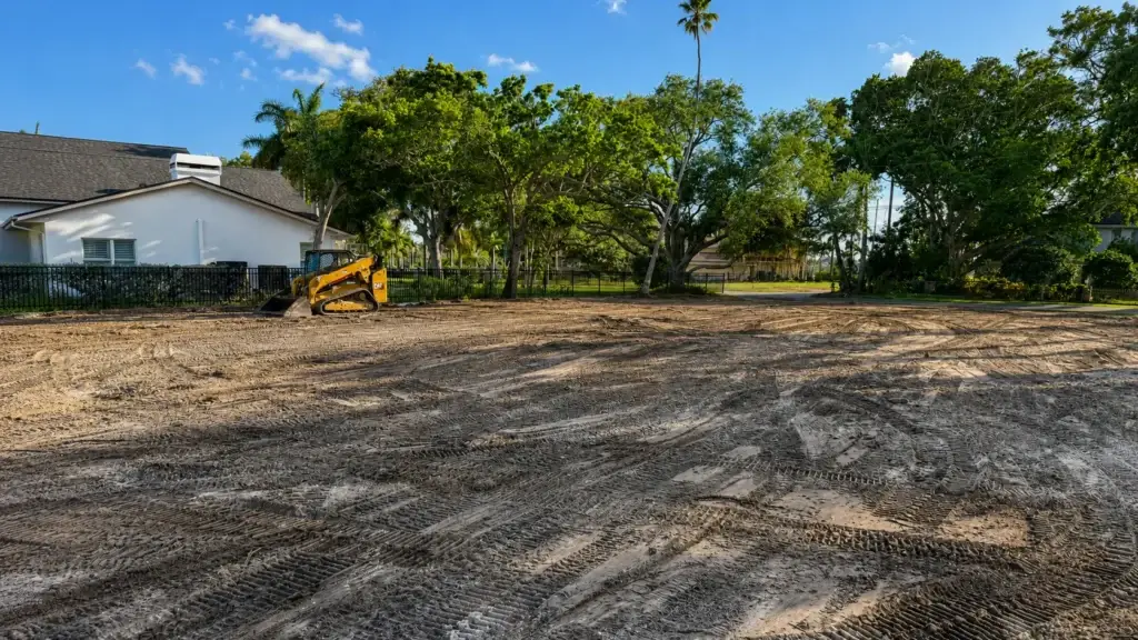 Cleared residential lot with CAT loader